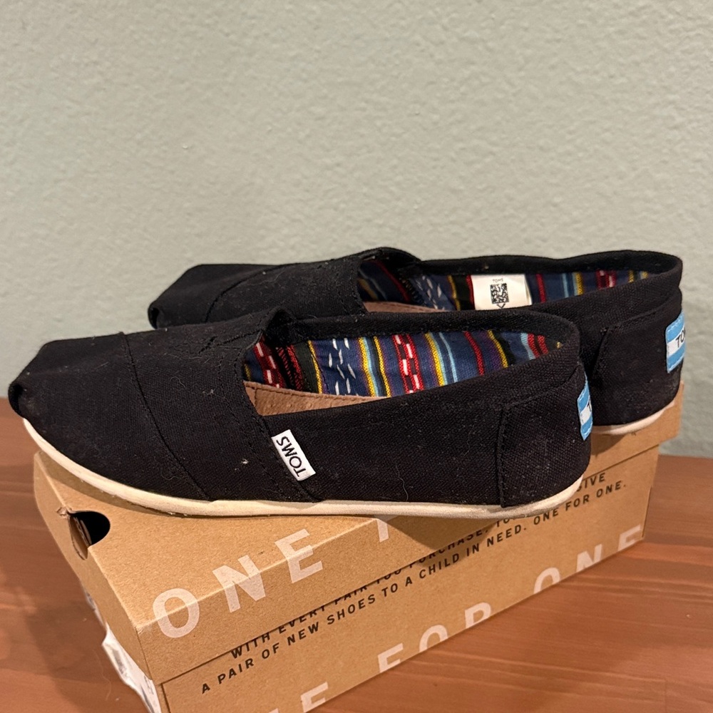 TOMS Black Canvas Slippers